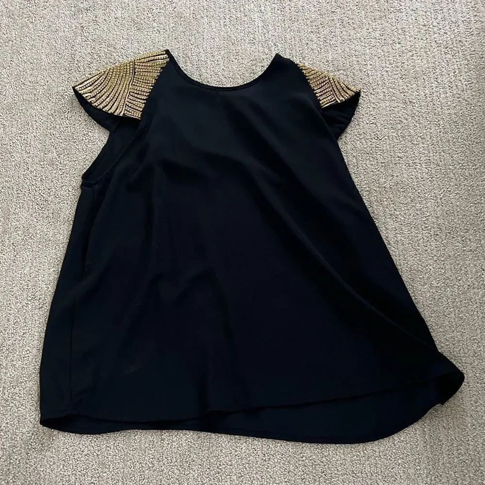 Romeo and Juliet Couture Black Top with Gold Gem Capped Sleeves